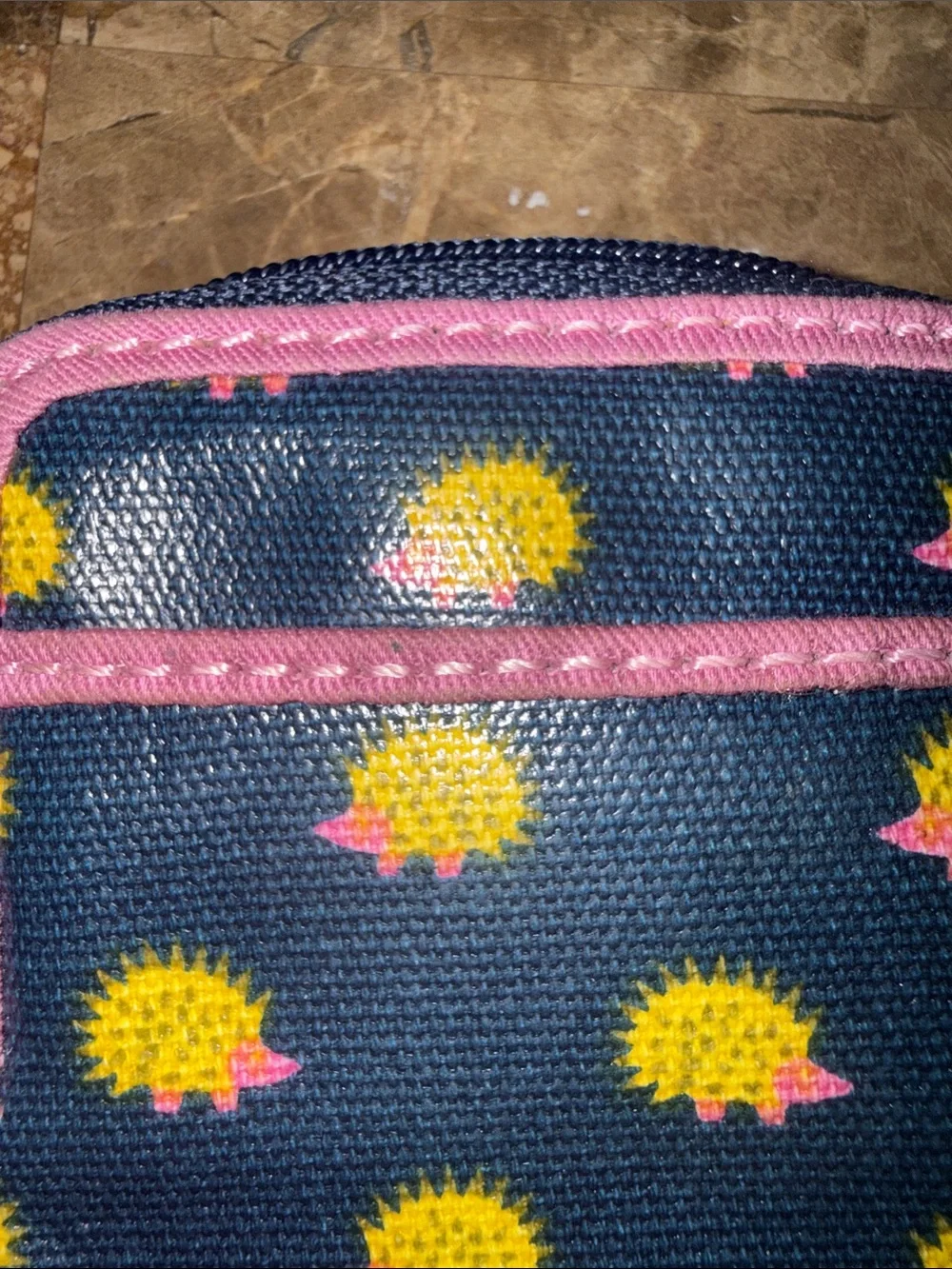 Retired Fossil Navy Phone Wristlet with Yellow Hedgehog Print and Pink Trim